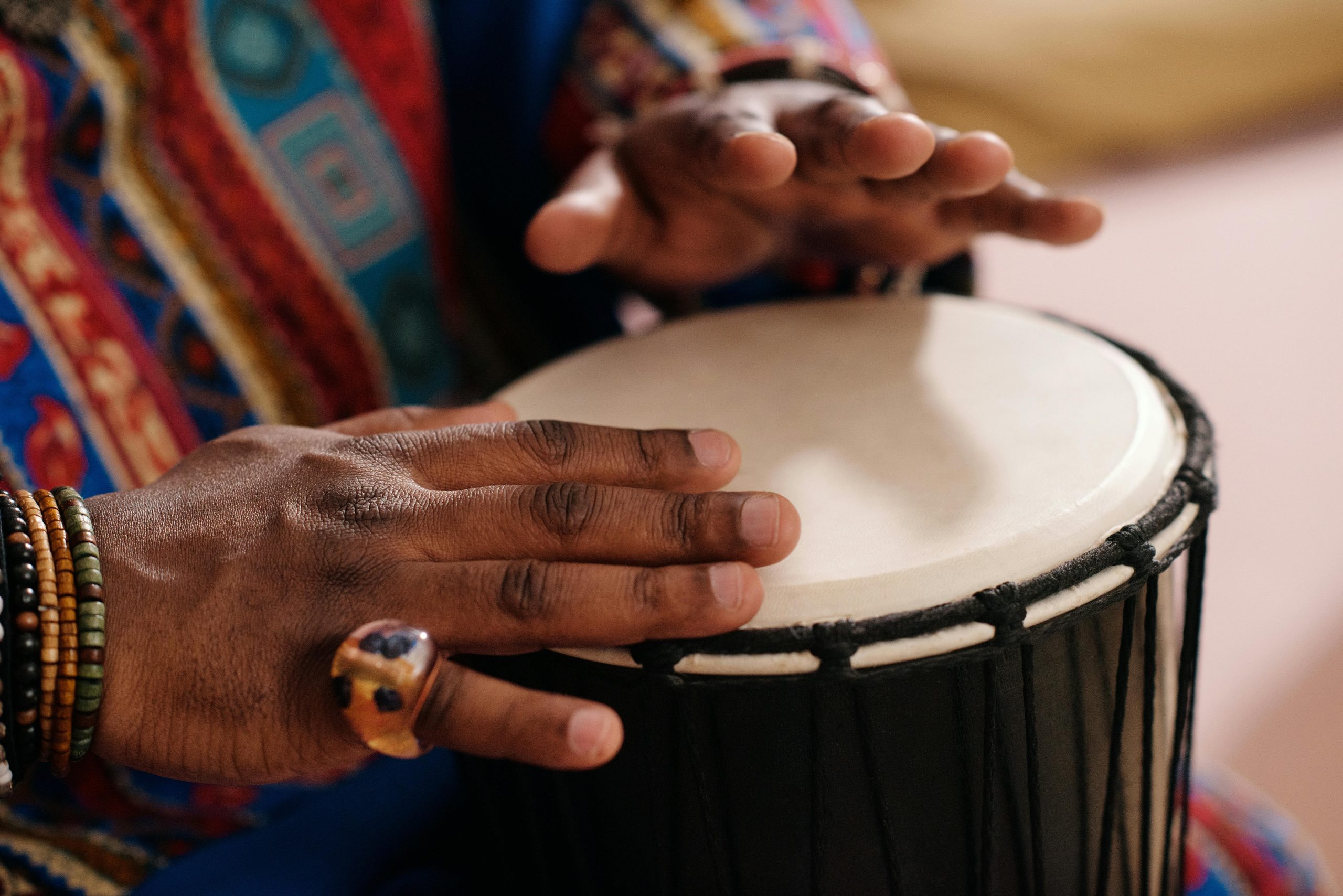 Person playing djembe